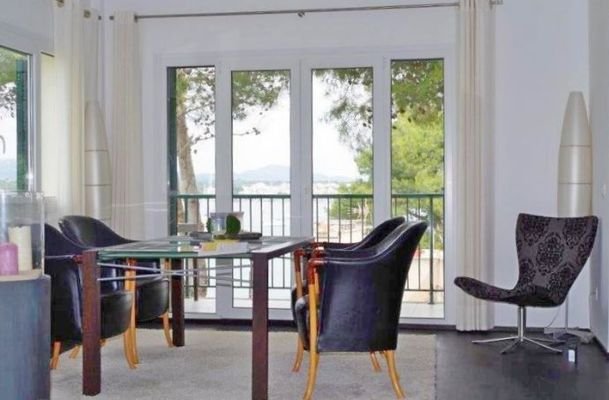 PORTO COLOM: Moderne Penthouse-Wohnung mit exklusiver Ausstattung und spektakulärem Blick auf den Naturhafen von Porto Colom